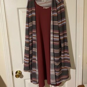 Worn once. Cute dress with a cardigan!